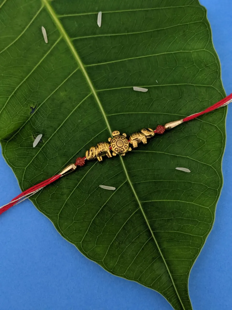 Latest Rakhi Design Gold Plated Tortoise/Elephant with Rudraksha Beads Pendant Mauli Raksha Bandhan